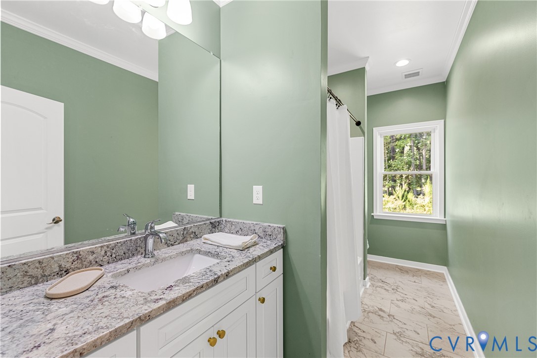 2211 Osborne Road Chester, VA 23831 - Photo 13 of 42 Hall bathroom, granite countertop vanity, tub and