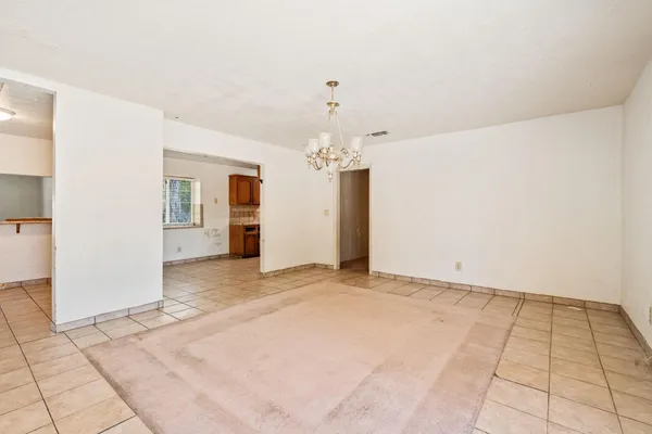 a view of kitchen with furniture and window