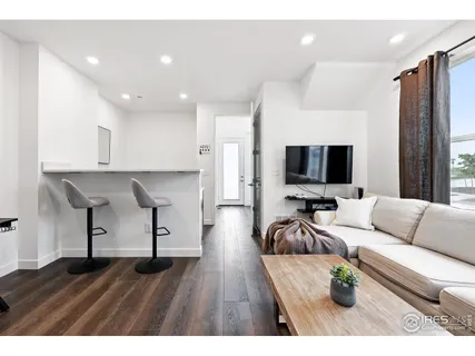 a bathroom with a sink toilet a mirror and shower