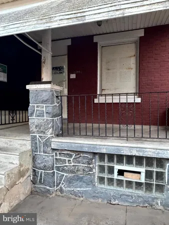a front view of a building with a shower