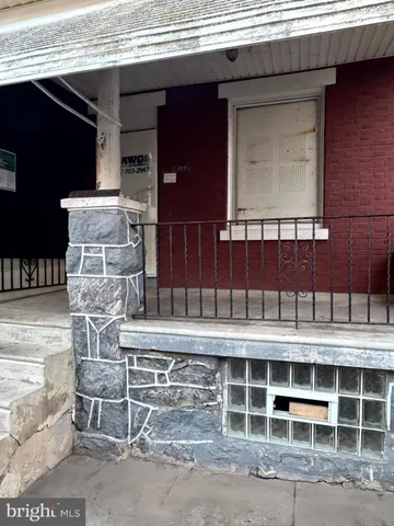 a front view of a building with a shower