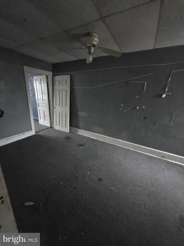 a view of empty room with windows