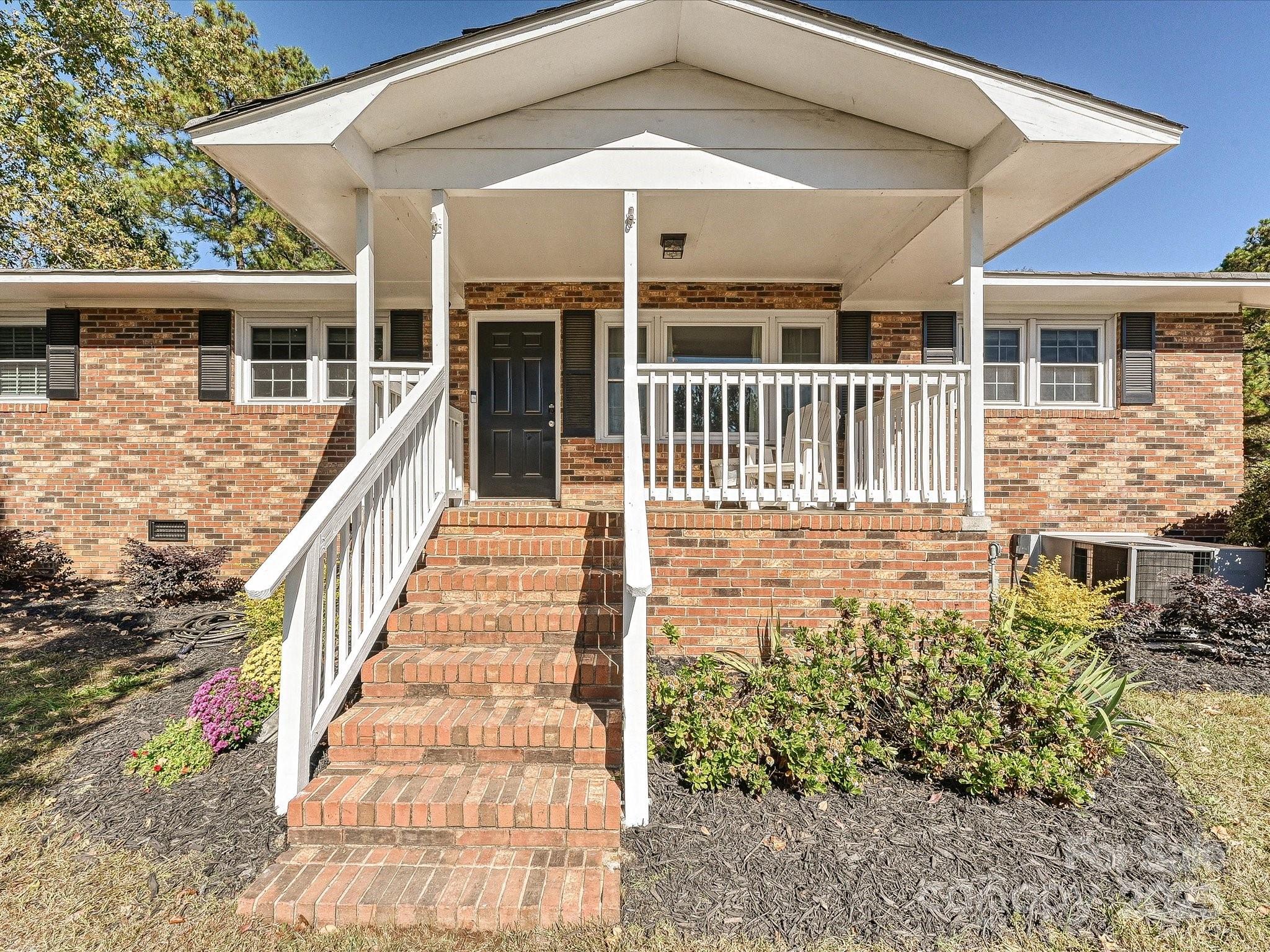 791 Sutton Spring Road York, SC 29745 - Photo 3 of 31 front view of a house with a porch