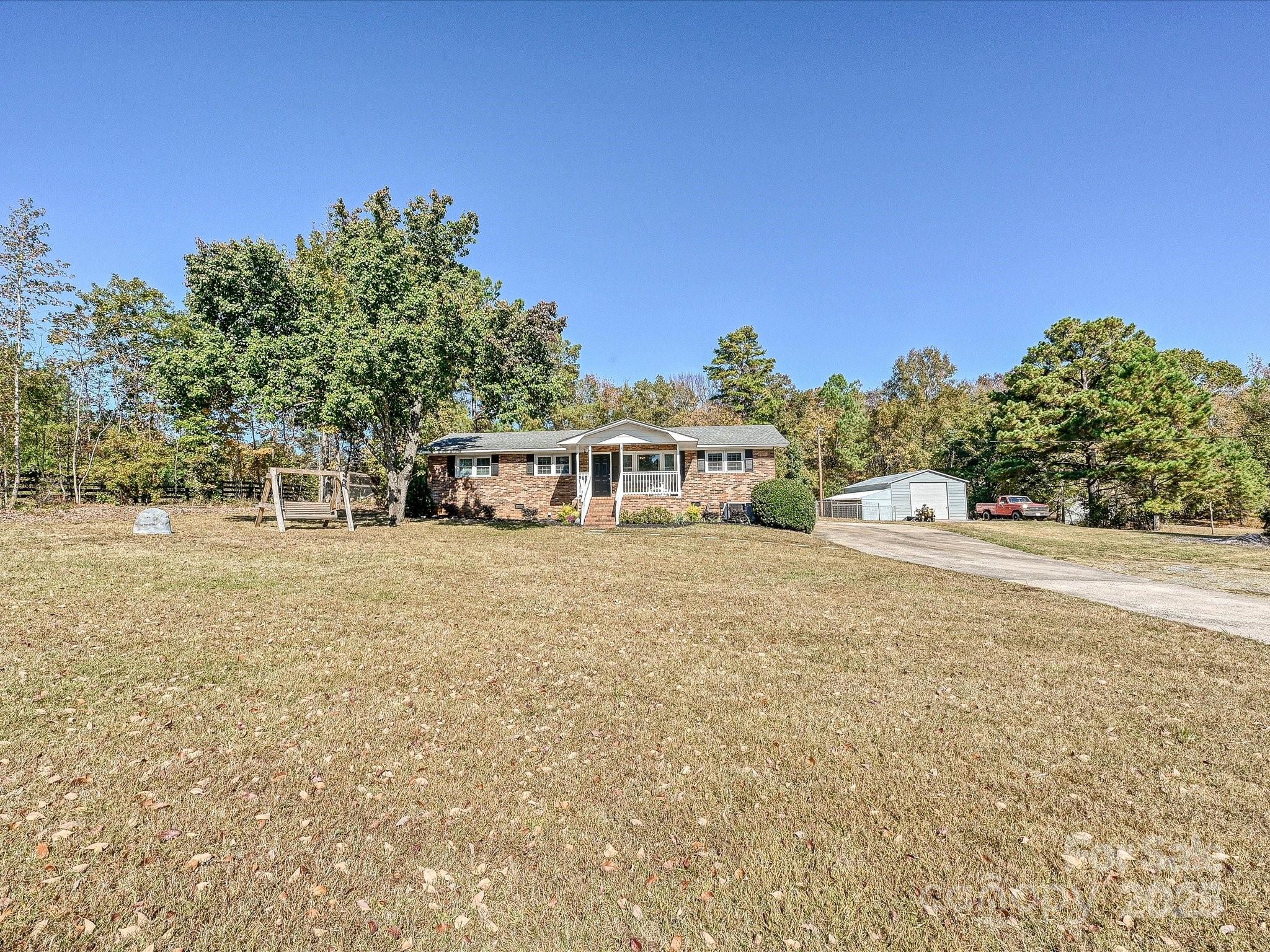791 Sutton Spring Road York, SC 29745 - Photo 31 of 31 a view of a house with a yard