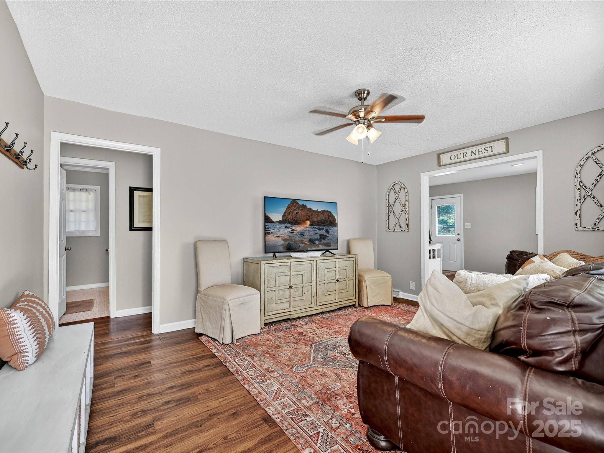 791 Sutton Spring Road York, SC 29745 - Photo 5 of 31 a living room with furniture and a flat screen tv