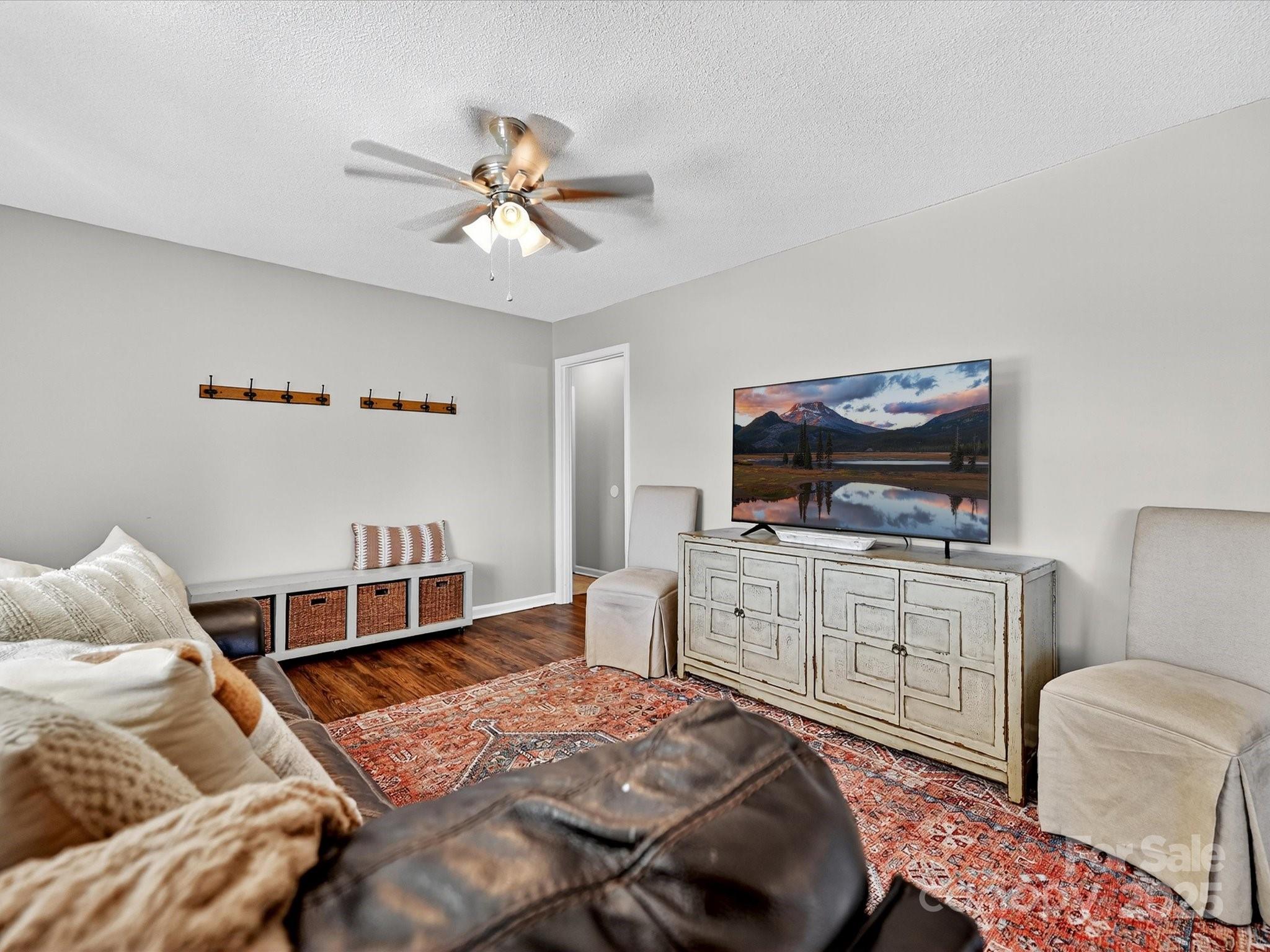 791 Sutton Spring Road York, SC 29745 - Photo 7 of 31 a bedroom with a bed and a tv in it
