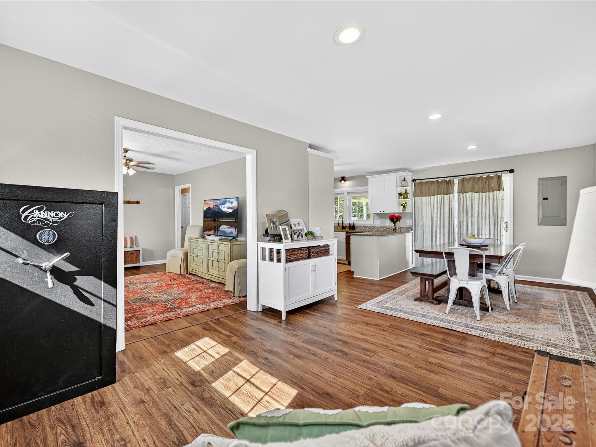 791 Sutton Spring Road York, SC 29745 - Photo 8 of 31 a living room with furniture and a wooden floor