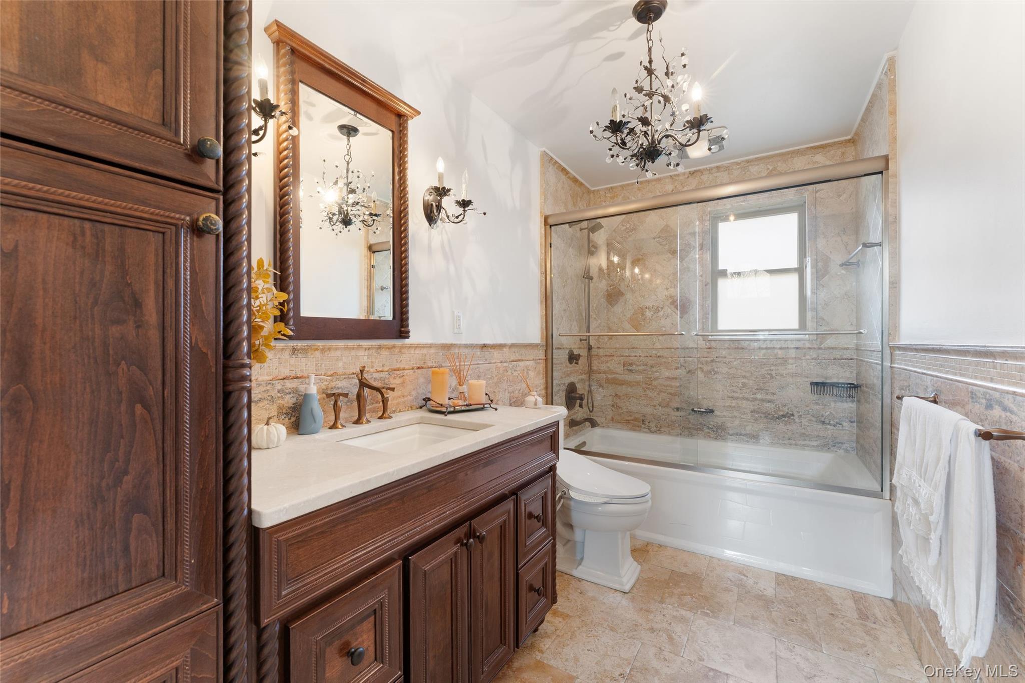 6 Hunting Ridge Road White Plains, NY 10605 - Photo 13 of 32 a bathroom with a sink a toilet a tub and shower