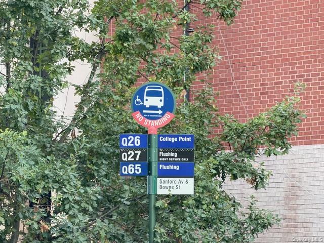 41-62 Bowne Street, Unit 9F Queens, NY 11355 - Photo 24 of 25 a sign that is on a brick wall