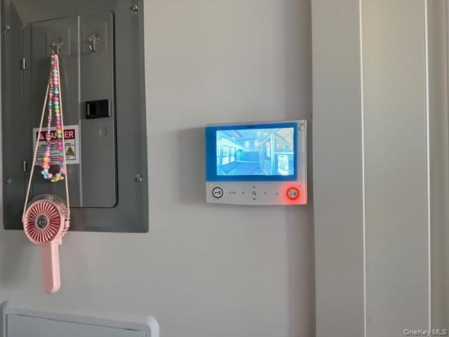 41-62 Bowne Street, Unit 9F Queens, NY 11355 - Photo 5 of 25 a bathroom with a shower