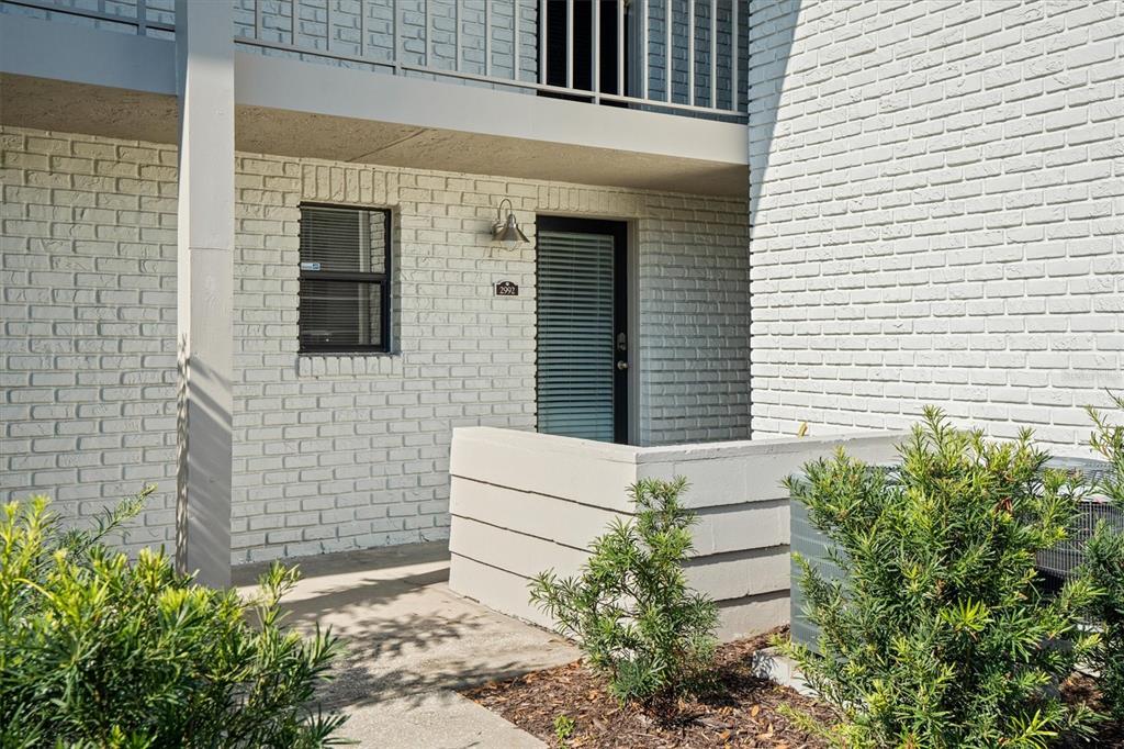 a view of house with backyard