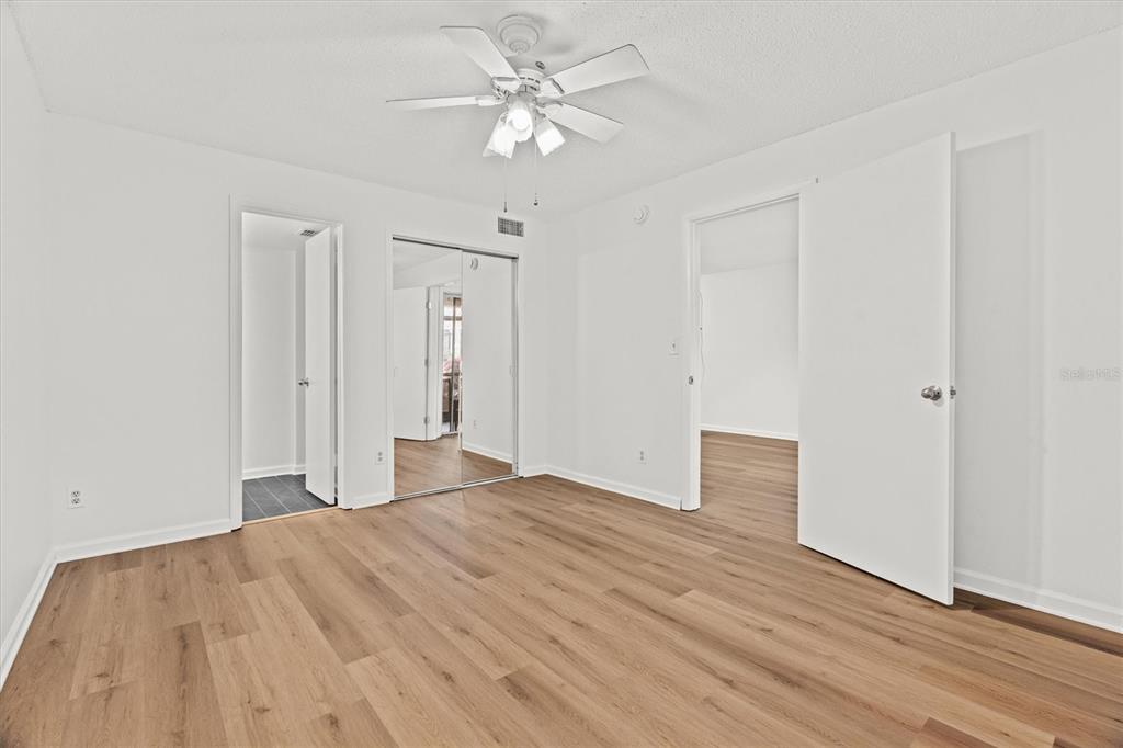 2992 Plaza Terrace Drive, Unit 2992 Orlando, FL 32803 - Photo 11 of 31 a view of empty room with wooden floor