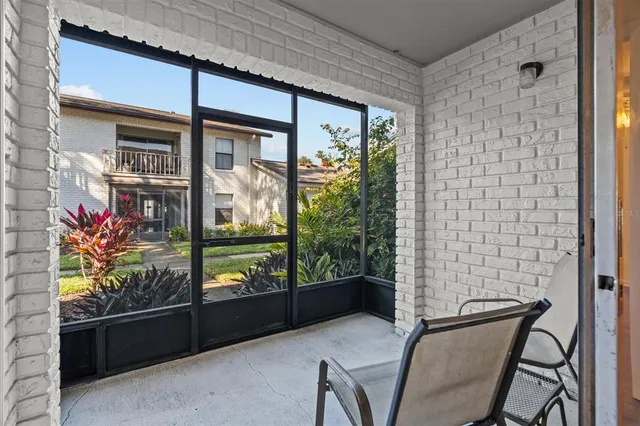 a view of a room with a large window