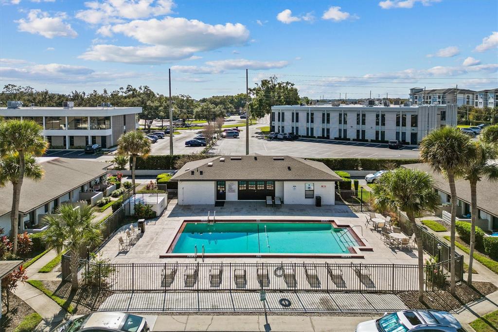 2992 Plaza Terrace Drive, Unit 2992 Orlando, FL 32803 - Photo 21 of 31 a aerial view of a house with a yard