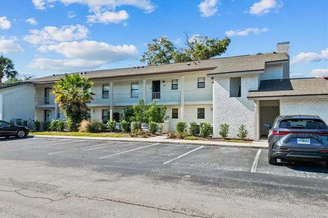 a car parked in front of a house