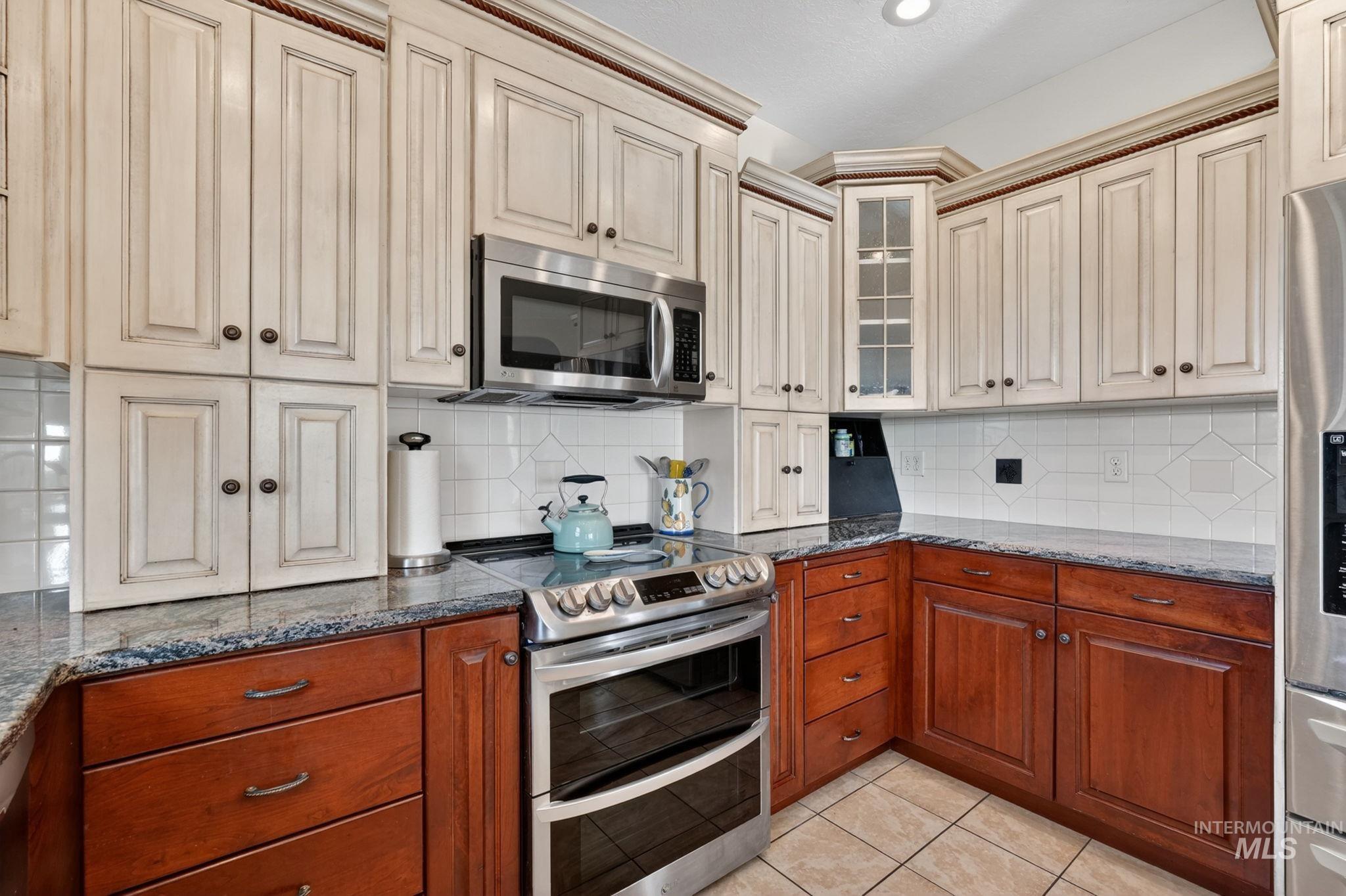 3352 Neeley Road American Falls, ID 83211 - Photo 12 of 43 Kitchen featuring a stainless steel range and microwave