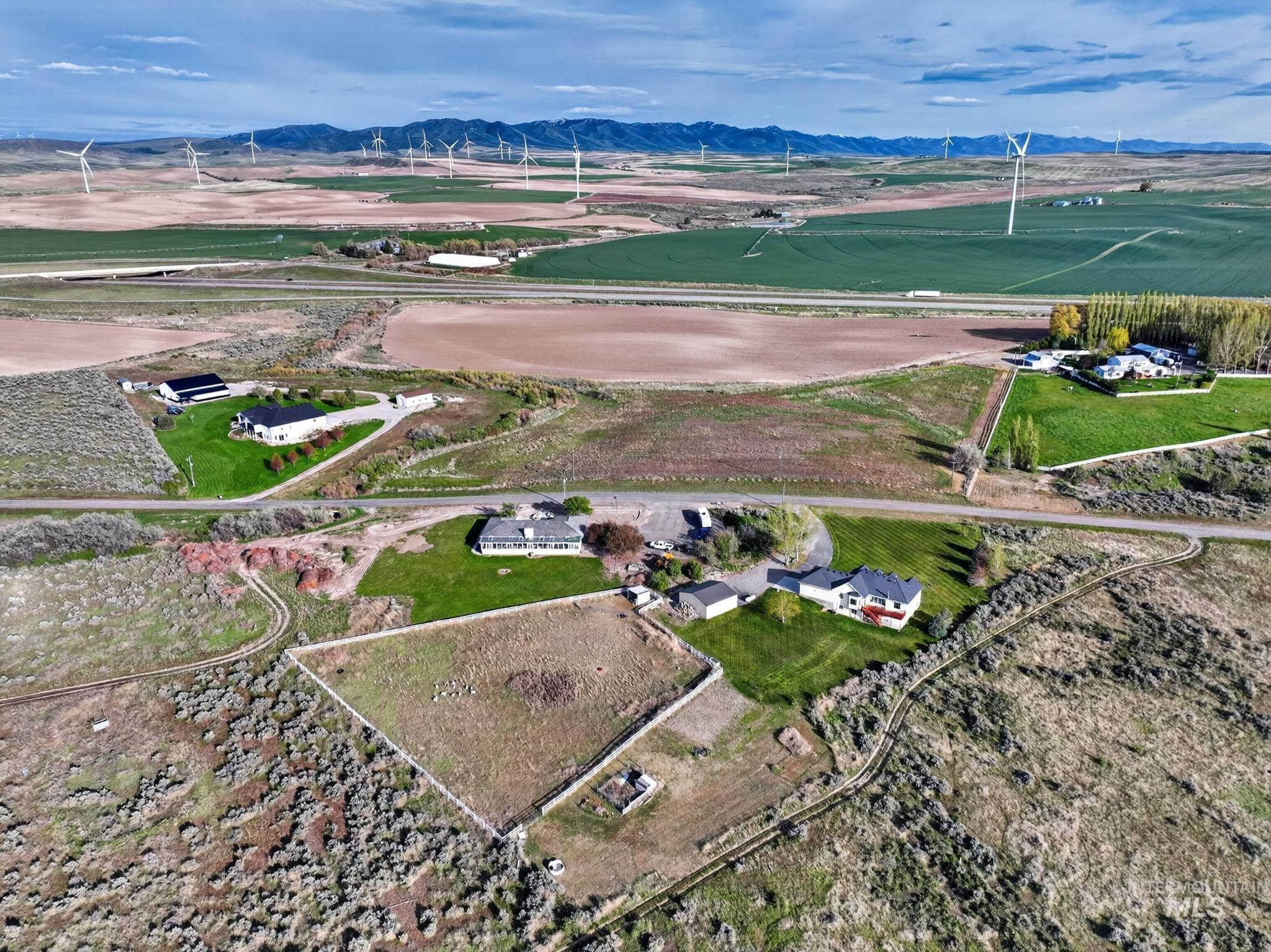 3352 Neeley Road American Falls, ID 83211 - Photo 39 of 43 Aerial view showcasing multiple properties set within an expansive rural landscape