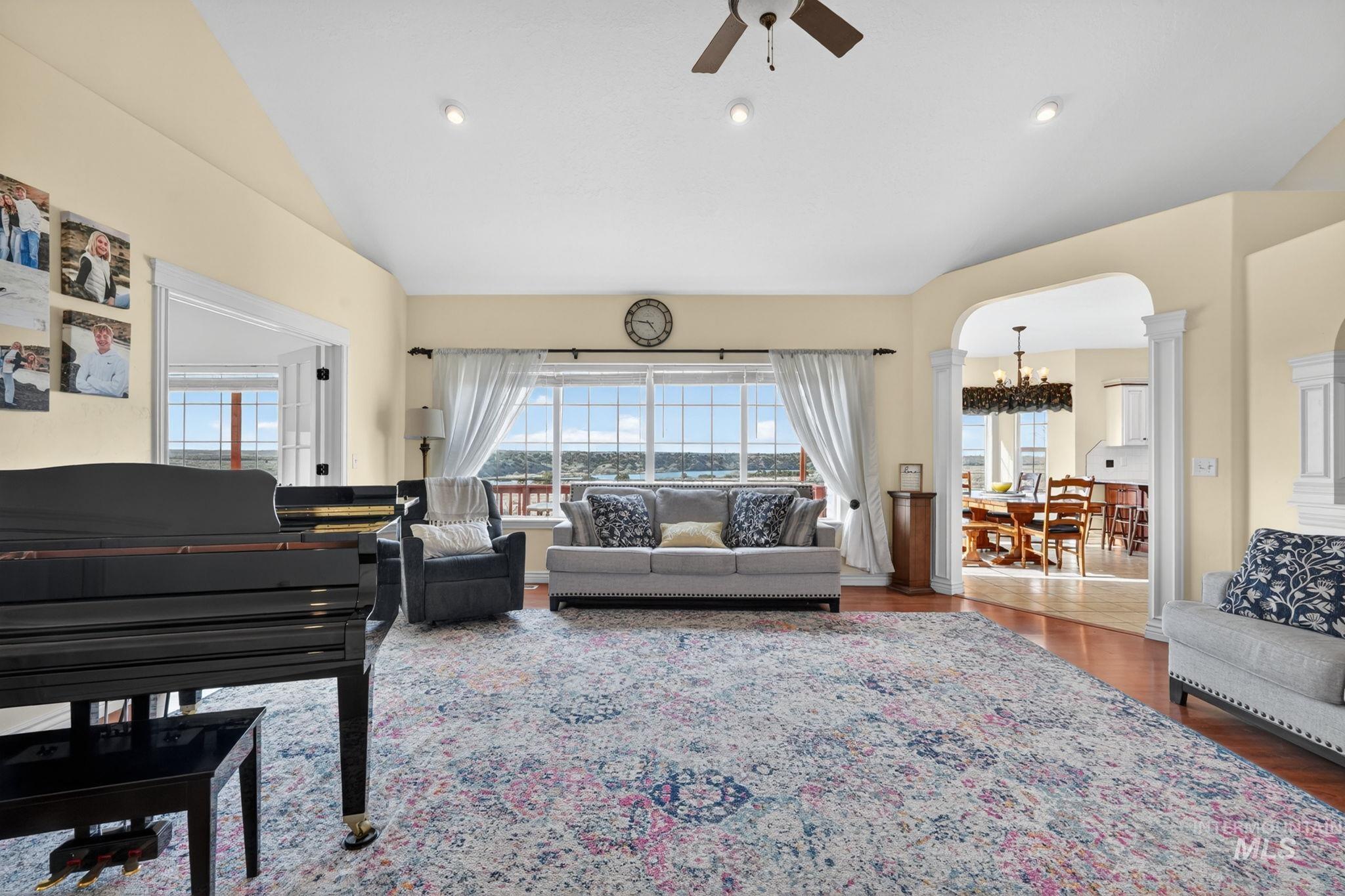 3352 Neeley Road American Falls, ID 83211 - Photo 4 of 43 Spacious living area featuring expansive windows, recessed lighting, and a ceiling fan