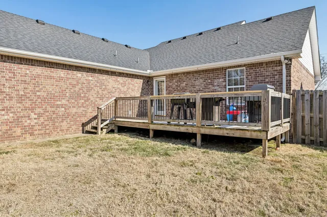 a view of roof deck with wooden floor and deck