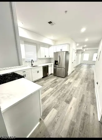 a large white room with a large window