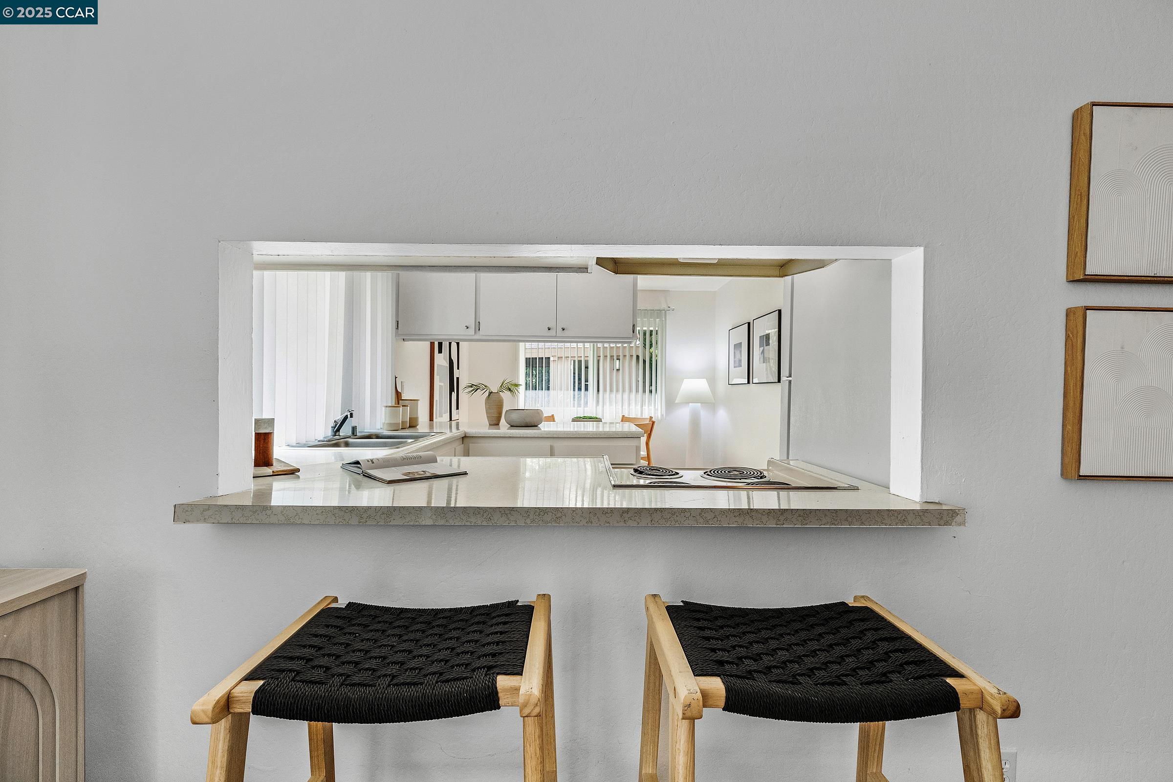 146 Ascot Court, Unit 2 Moraga, CA 94556 - Photo 15 of 33 a kitchen with stainless steel appliances a sink and cabinets