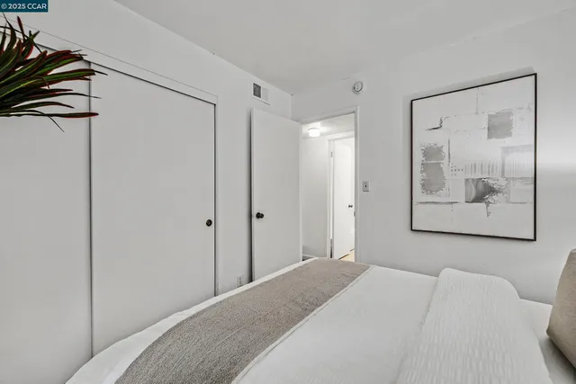 a view of hallway with wooden floor
