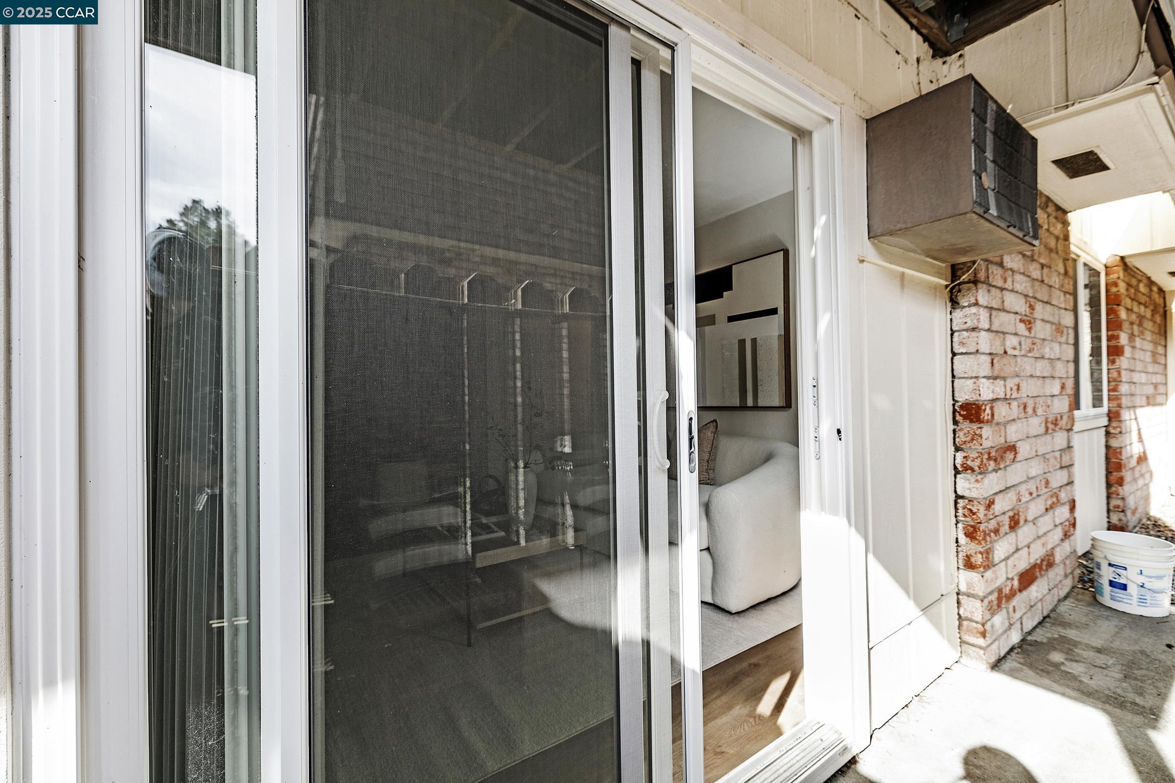 146 Ascot Court, Unit 2 Moraga, CA 94556 - Photo 28 of 33 a bathroom with a glass shower door and a mirror