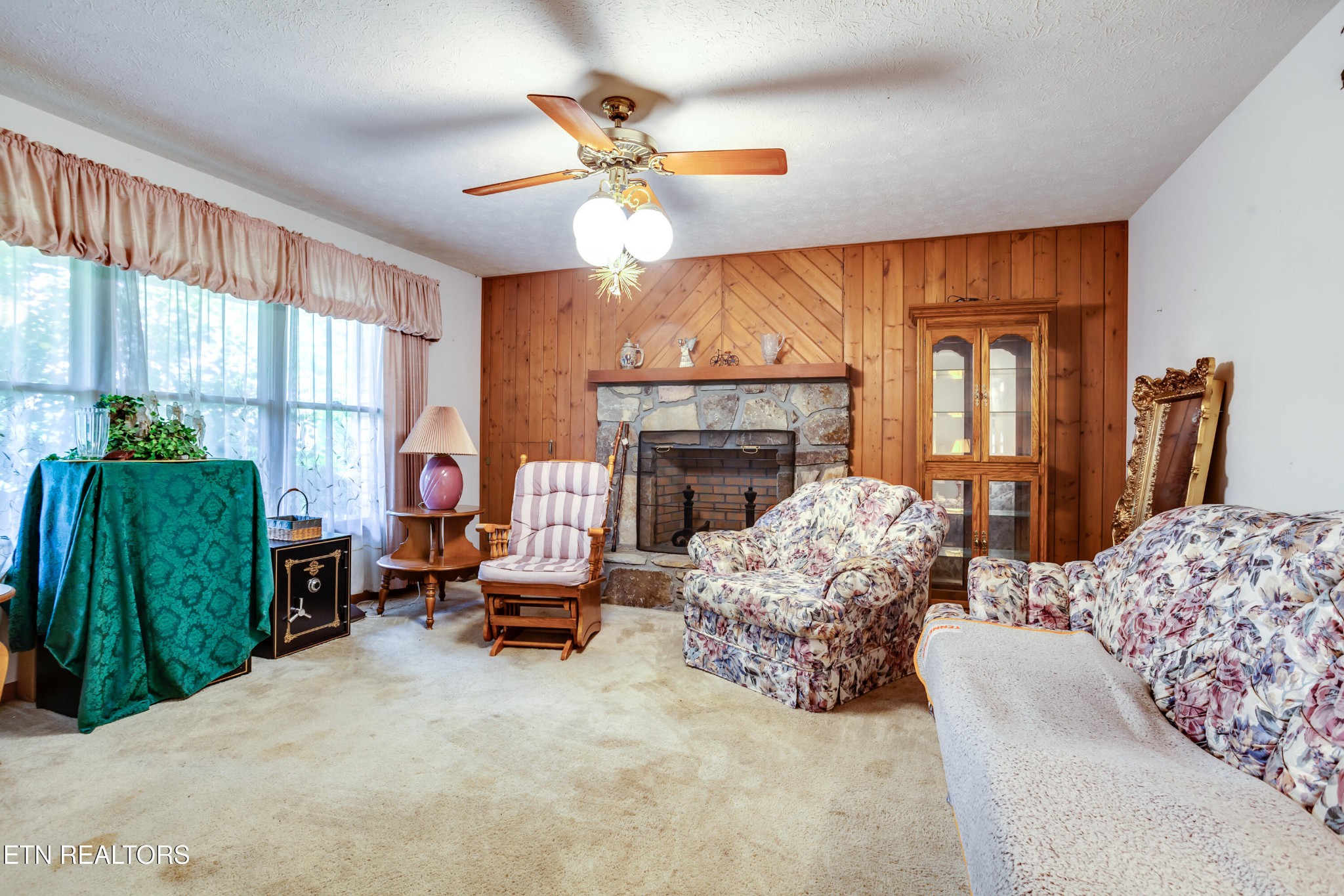 375 Rainbow Road Sevierville, TN 37862 - Photo 14 of 58 a living room with furniture and a fireplace