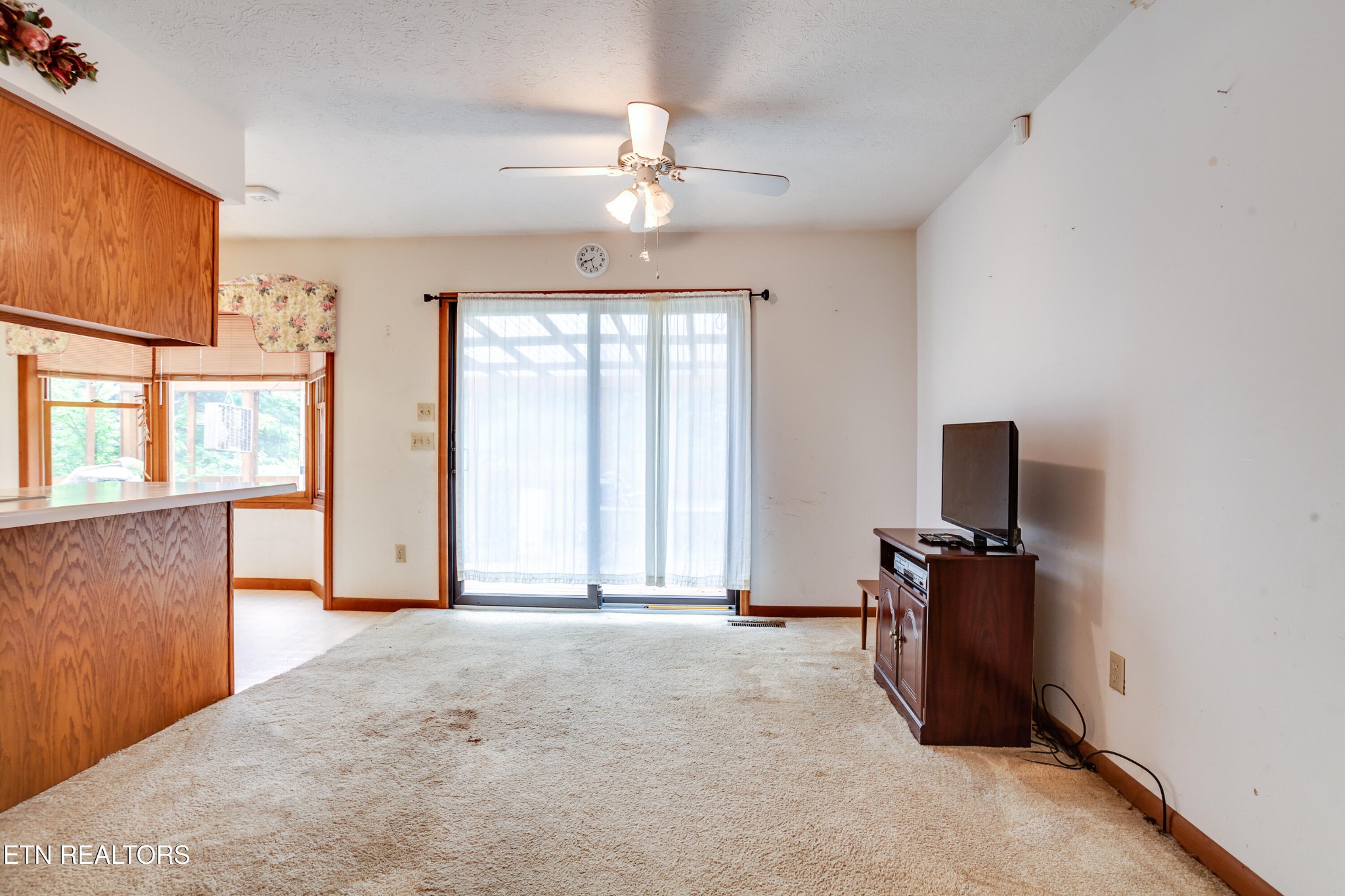 375 Rainbow Road Sevierville, TN 37862 - Photo 16 of 58 wooden floor in an empty room with a window