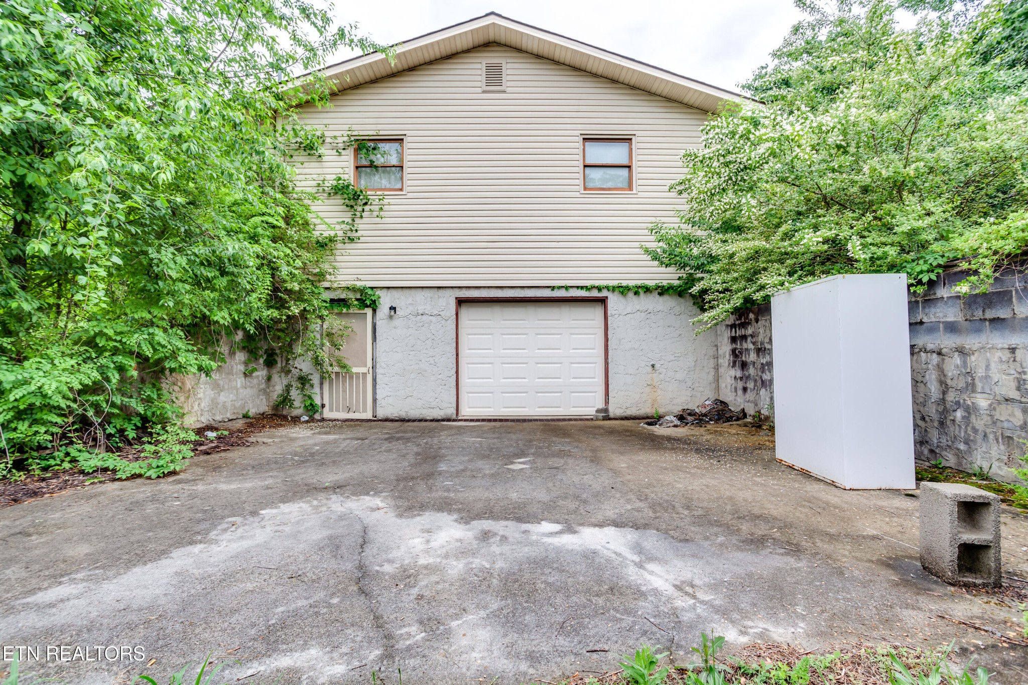 375 Rainbow Road Sevierville, TN 37862 - Photo 10 of 58 a view of a house with a yard and garage