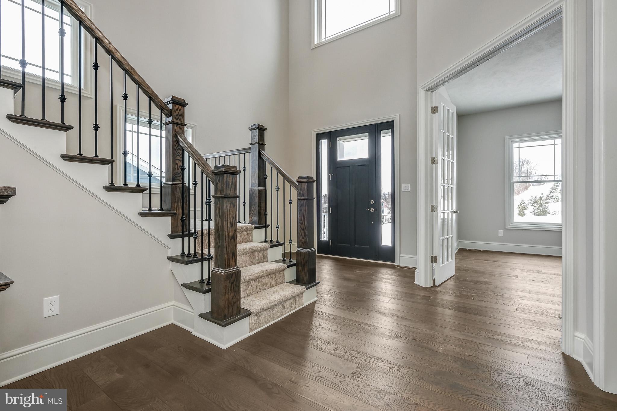 510 Newcomen Road, Unit M1D Exton, PA 19341 - Photo 7 of 34 a view of an entryway with wooden floor and windows