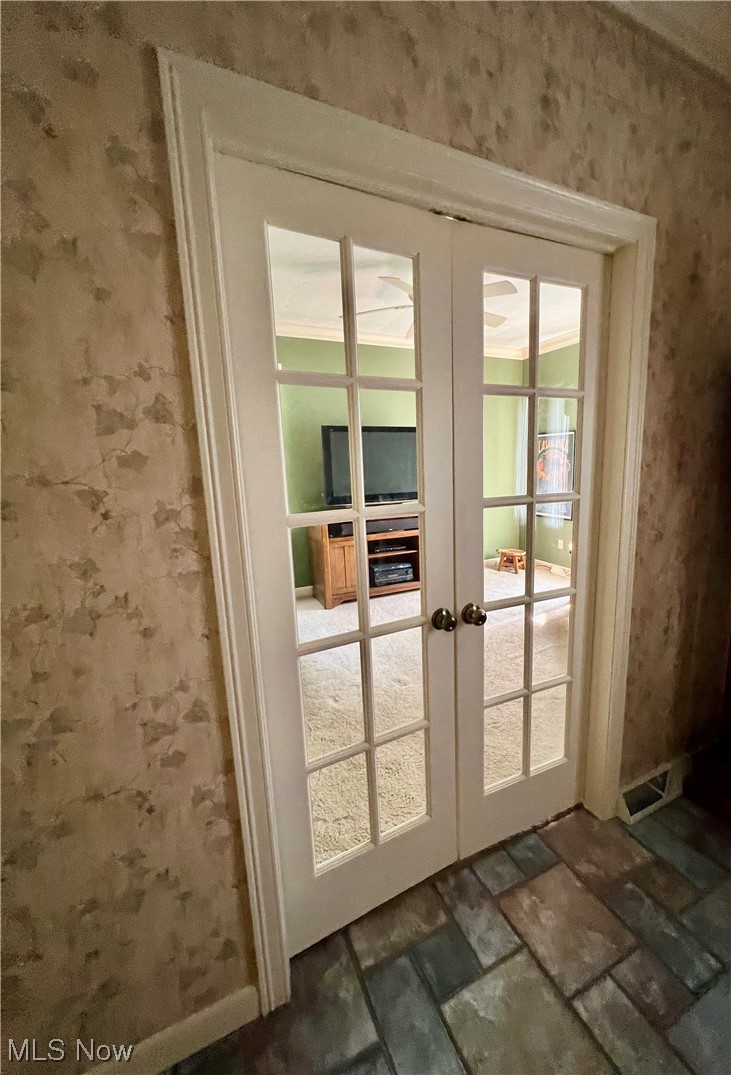 Doorway to outside featuring french doors