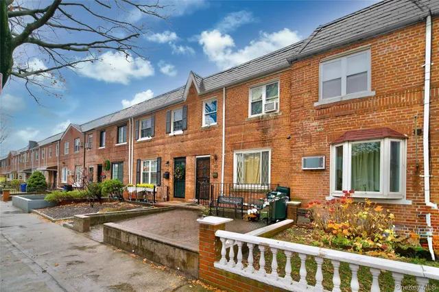 a front view of a building with street view