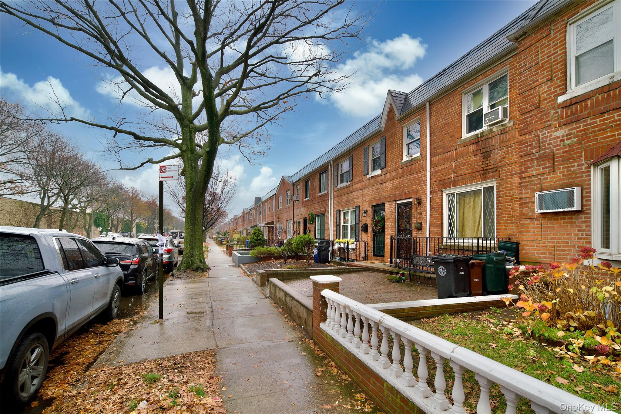 19-22 81st Street Queens, NY 11370 - Photo 4 of 10 View of asphalt road with sidewalks and a residential view