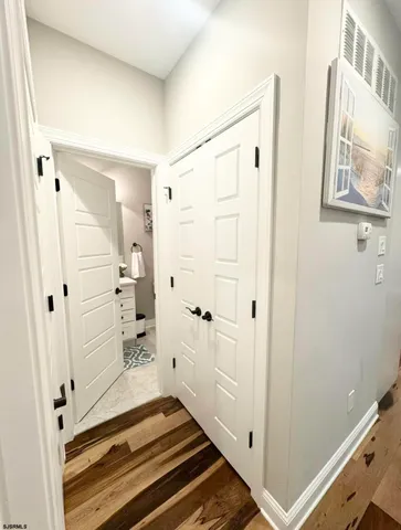 a bathroom with a sink double vanity and a mirror