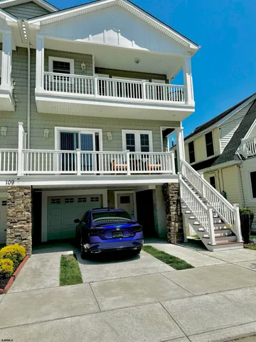 a view of a balcony with furniture
