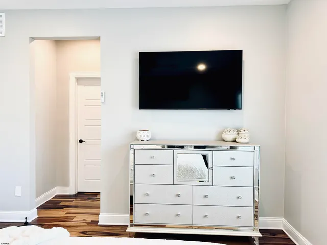 a view of a hallway to a window
