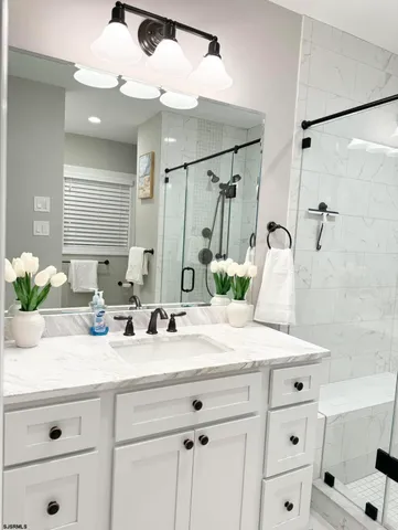 a view of an chairs and table in the balcony