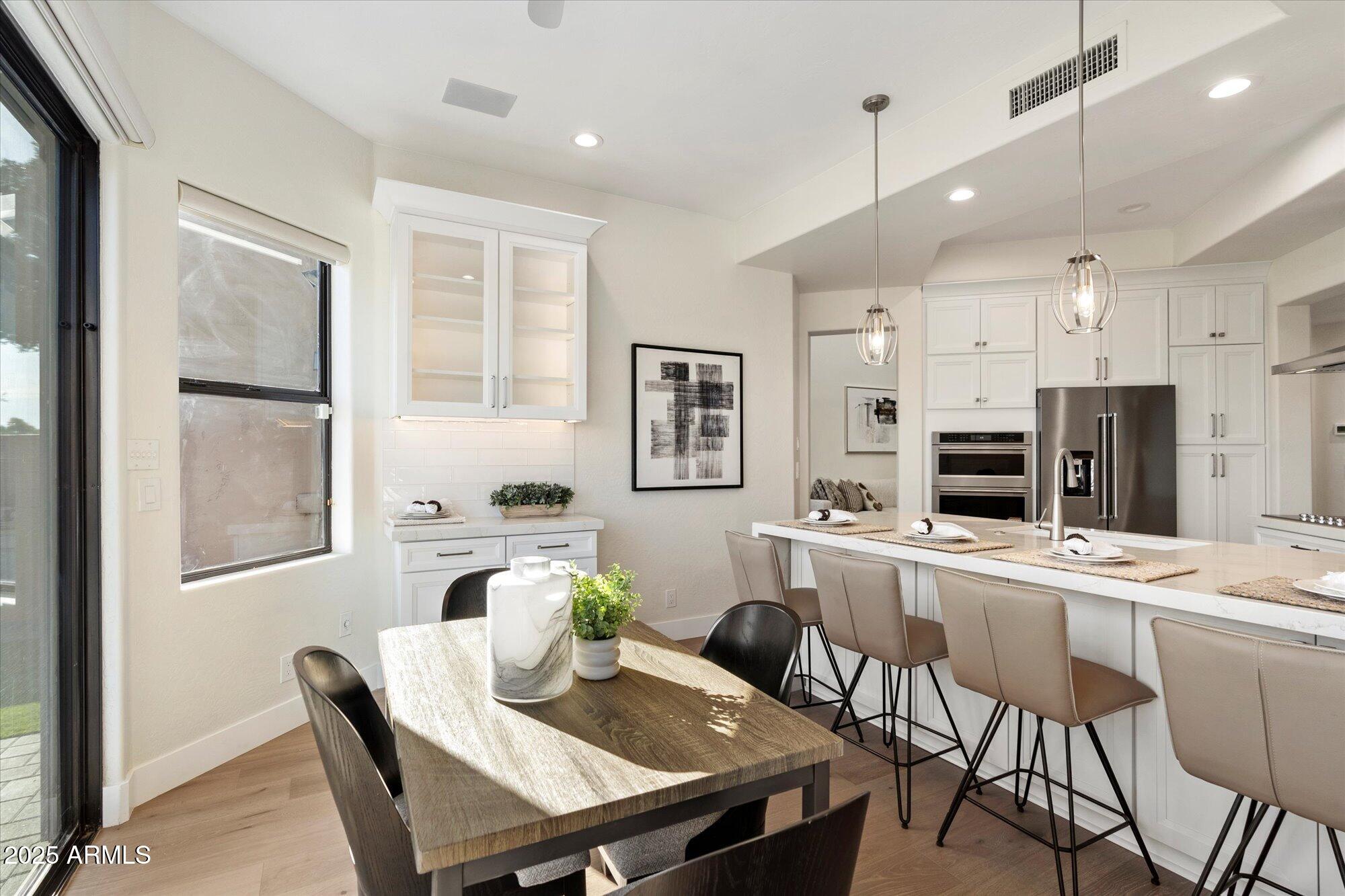 7955 East Chaparral Road, Unit 17 Scottsdale, AZ 85250 - Photo 16 of 57 Breakfast Room adjoins New Kitchen