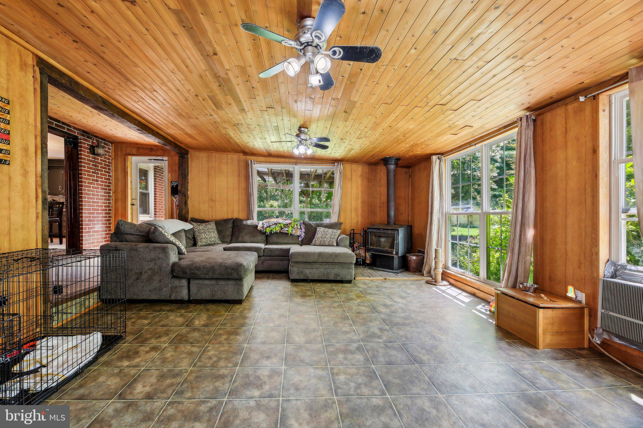 857 White Hall Road Littlestown, PA 17340 - Photo 12 of 32 a living room with furniture and a large window