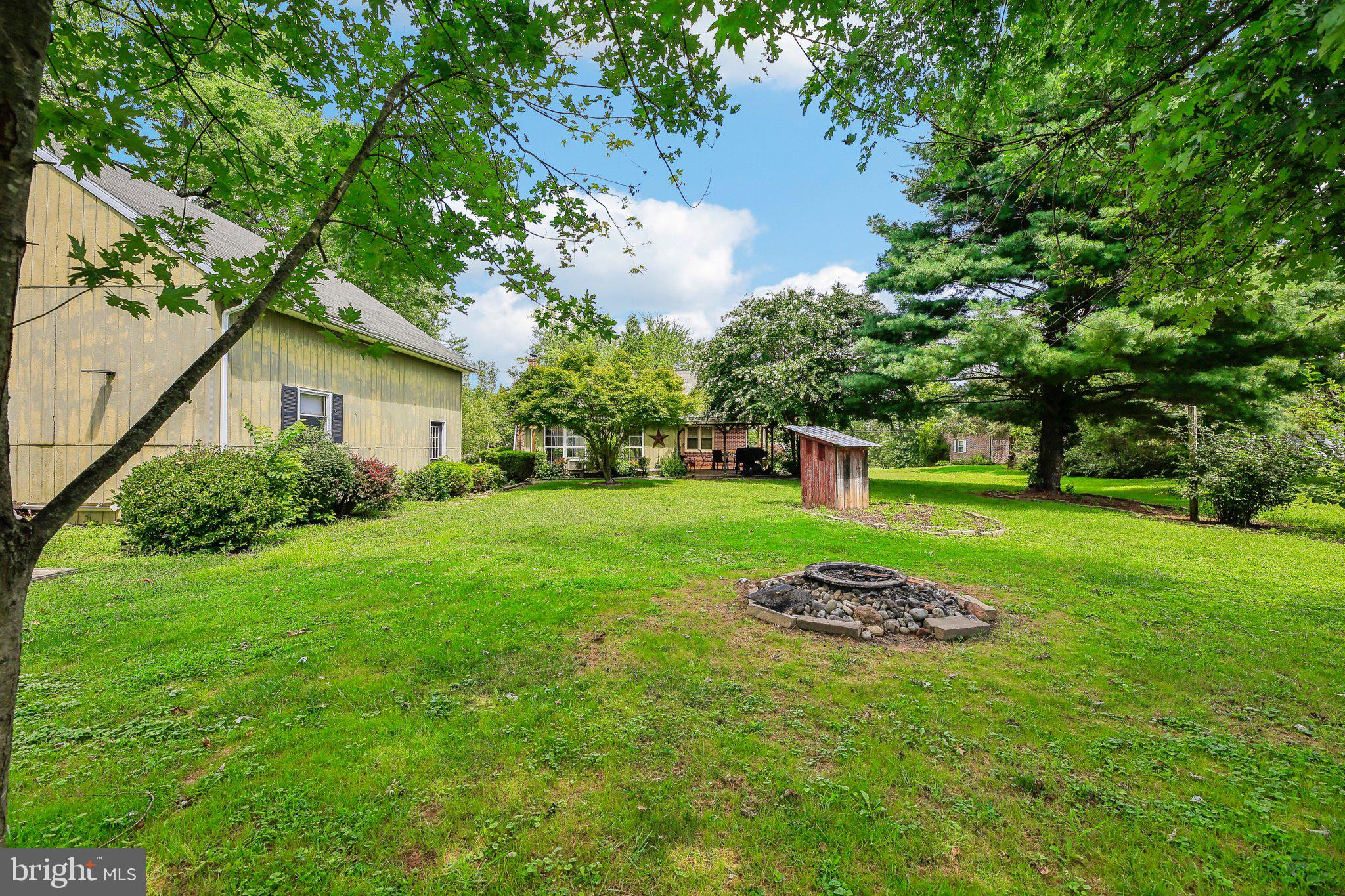 857 White Hall Road Littlestown, PA 17340 - Photo 15 of 32 a big yard with palm trees