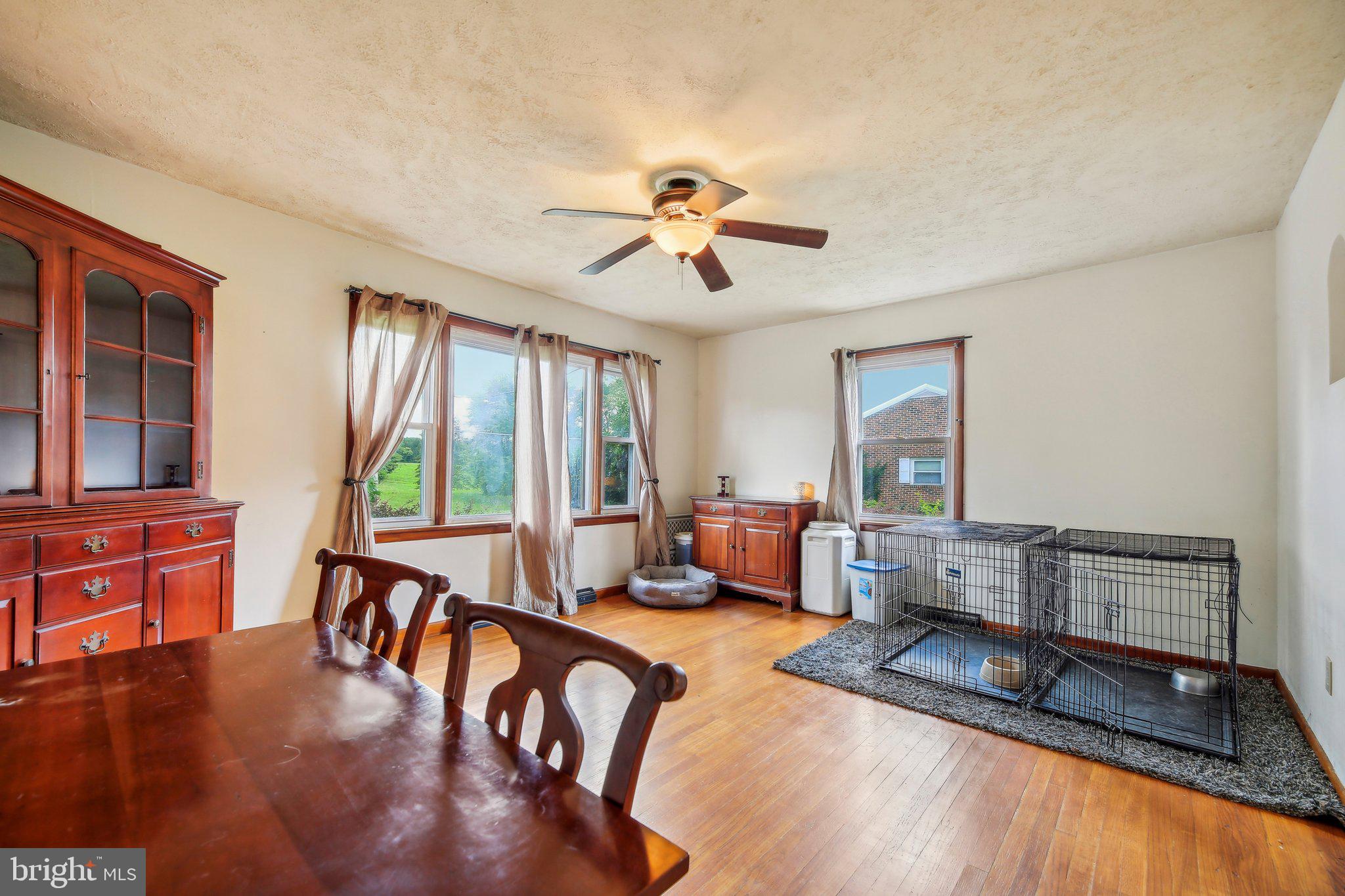 857 White Hall Road Littlestown, PA 17340 - Photo 8 of 32 a living room with furniture fireplace and flat screen tv
