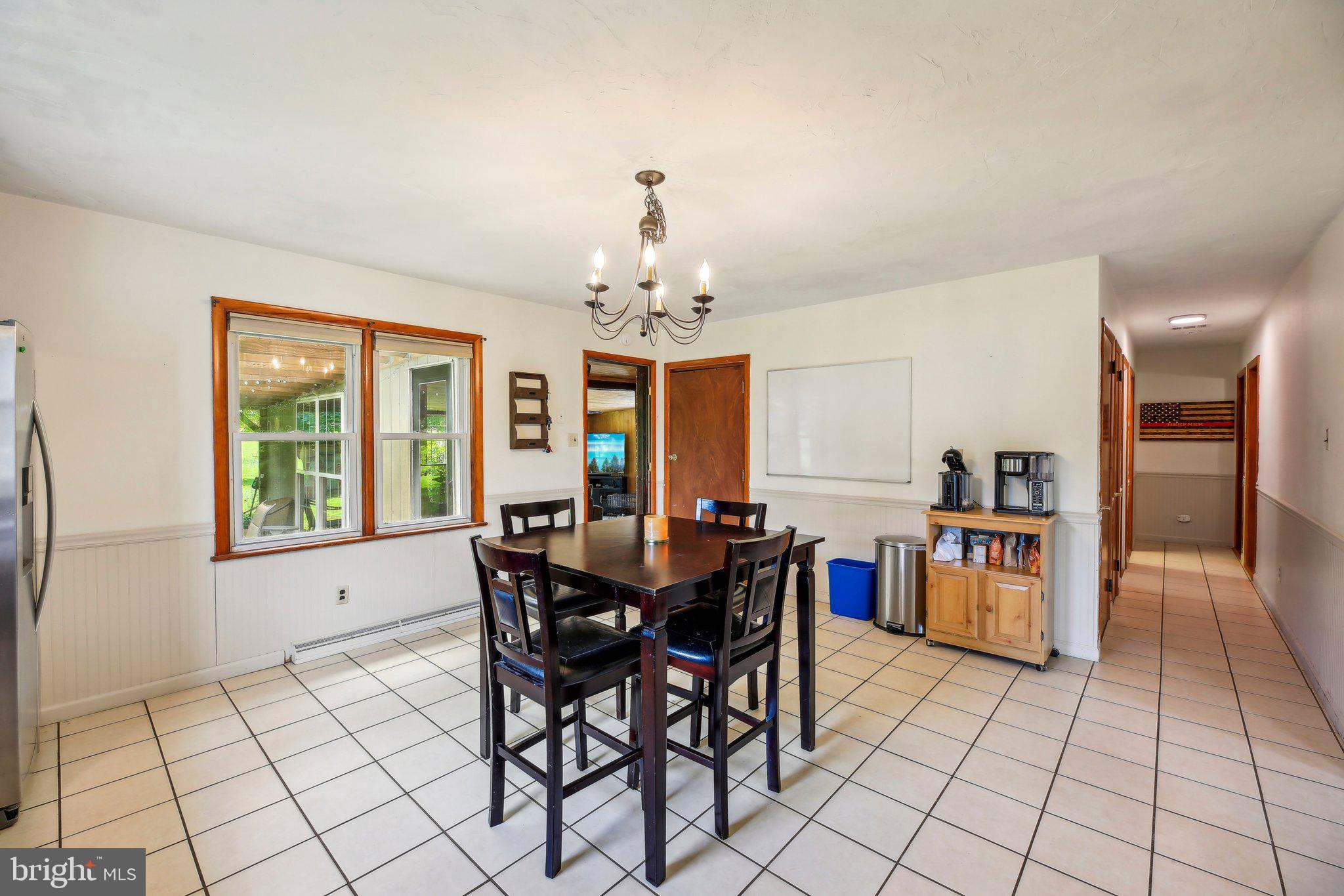 857 White Hall Road Littlestown, PA 17340 - Photo 9 of 32 a view of a dining room with furniture and window