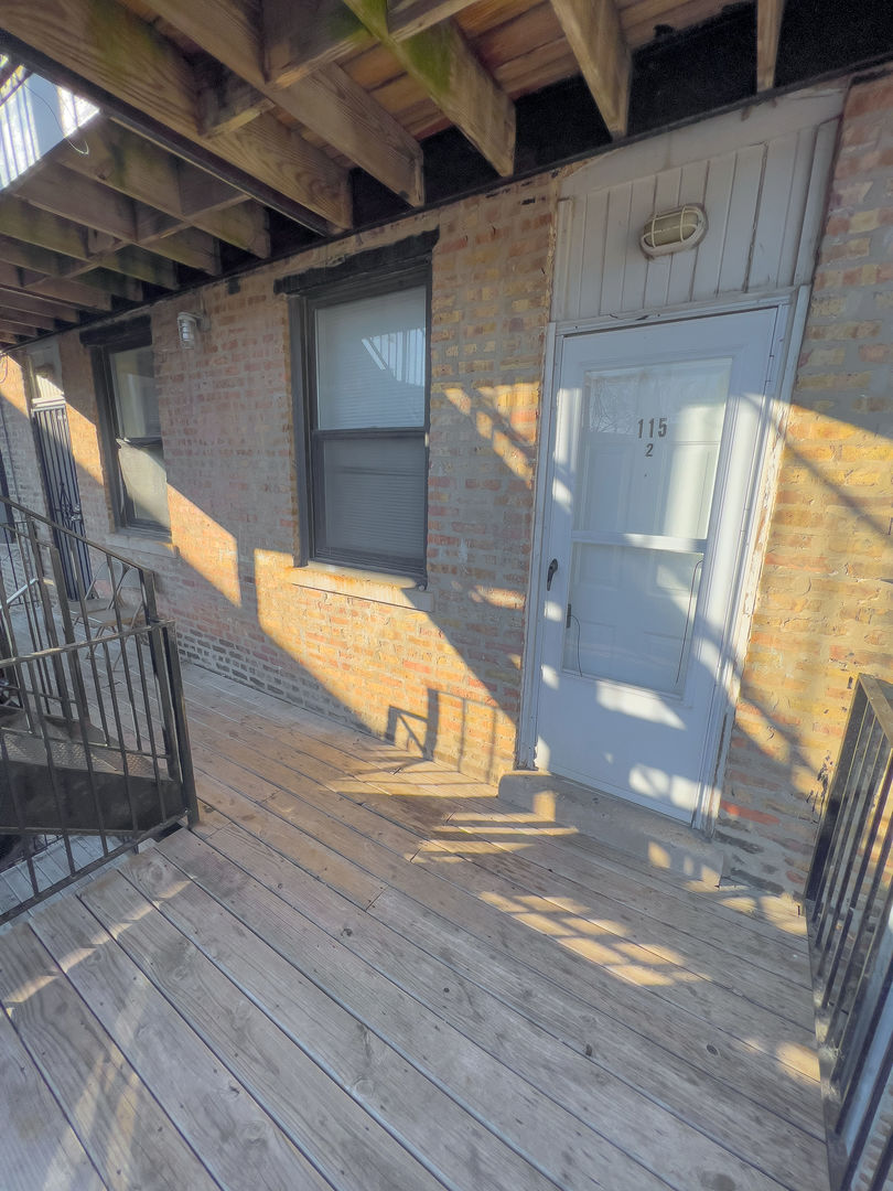 115 East 60th Street, Unit 2 Chicago, IL 60637 - Photo 2 of 11 a view of a door of the house