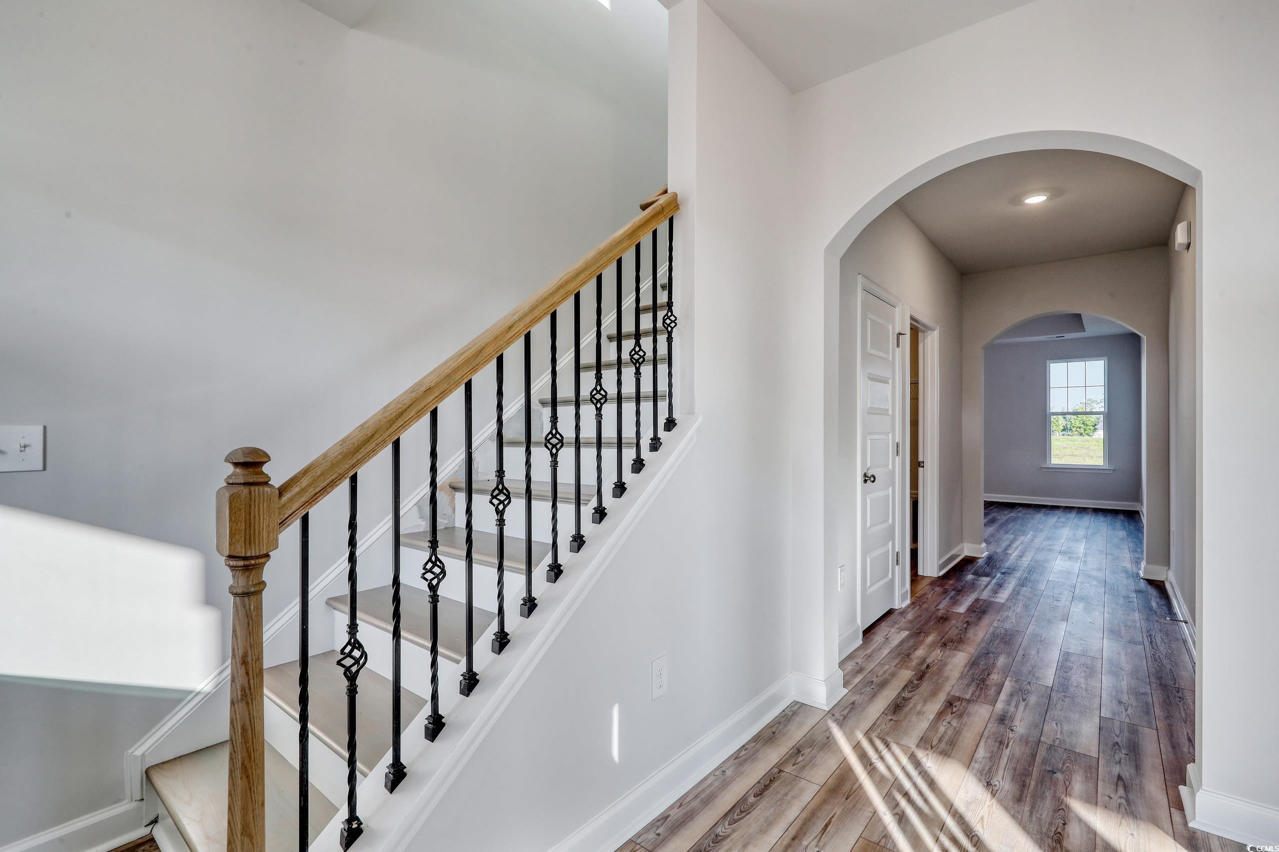 771 Enchantment Loop Myrtle Beach, SC 29588 - Photo 2 of 40 Stairway featuring hardwood / wood-style flooring