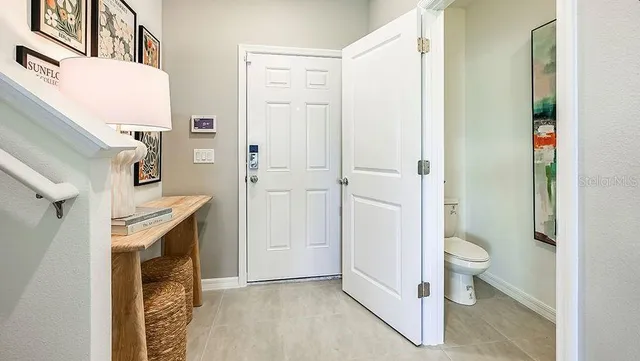 a bathroom with a sink and toilet