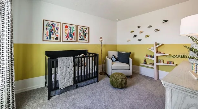 a bedroom with a bed and a couch