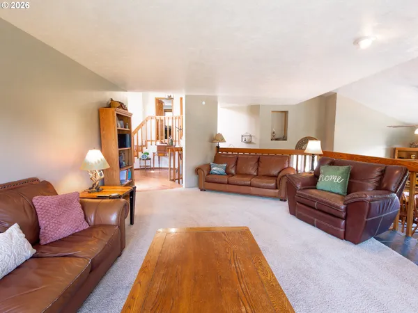 a living room with furniture and a couch
