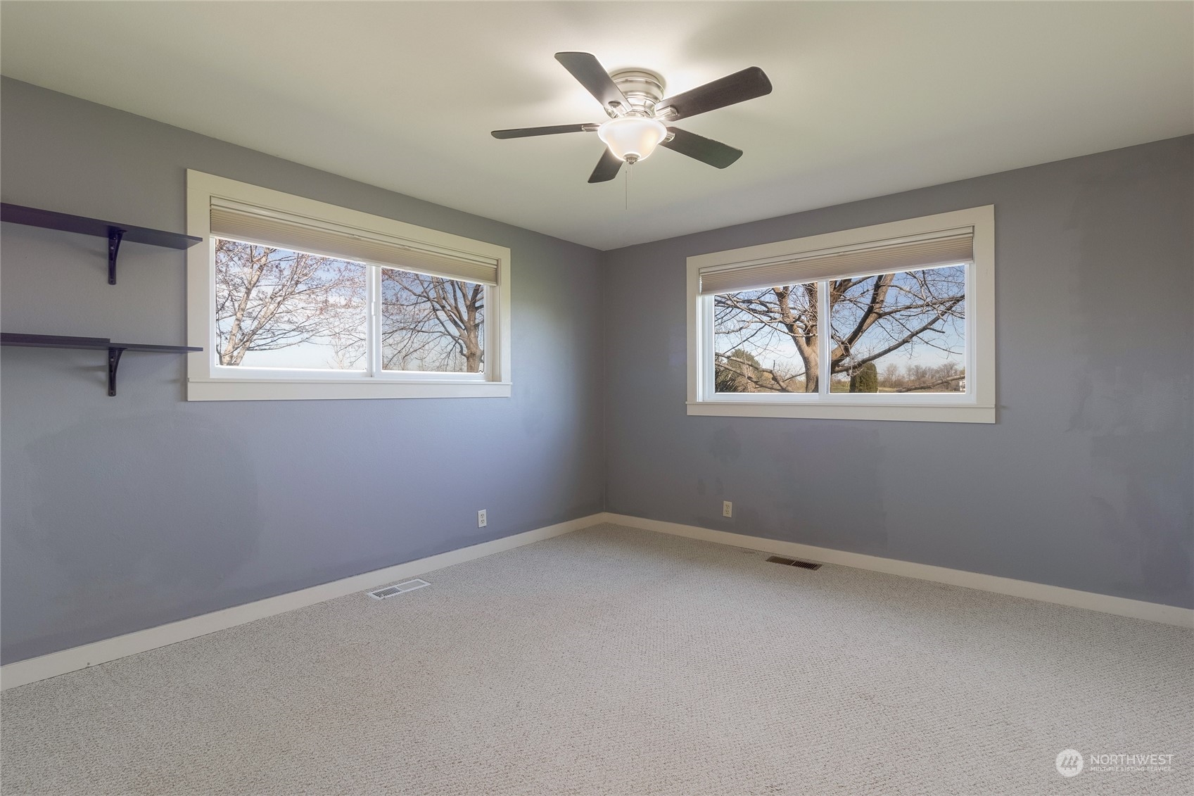 1479 Spring Branch Road Walla Walla, WA 99362 - Photo 22 of 40 a view of room with window and ceiling fan