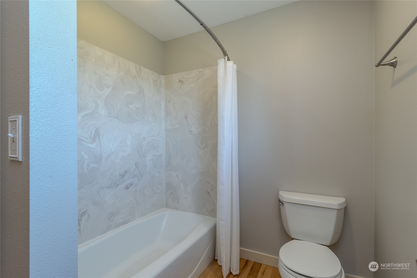 1479 Spring Branch Road Walla Walla, WA 99362 - Photo 24 of 40 a white toilet sitting next to a bath tub